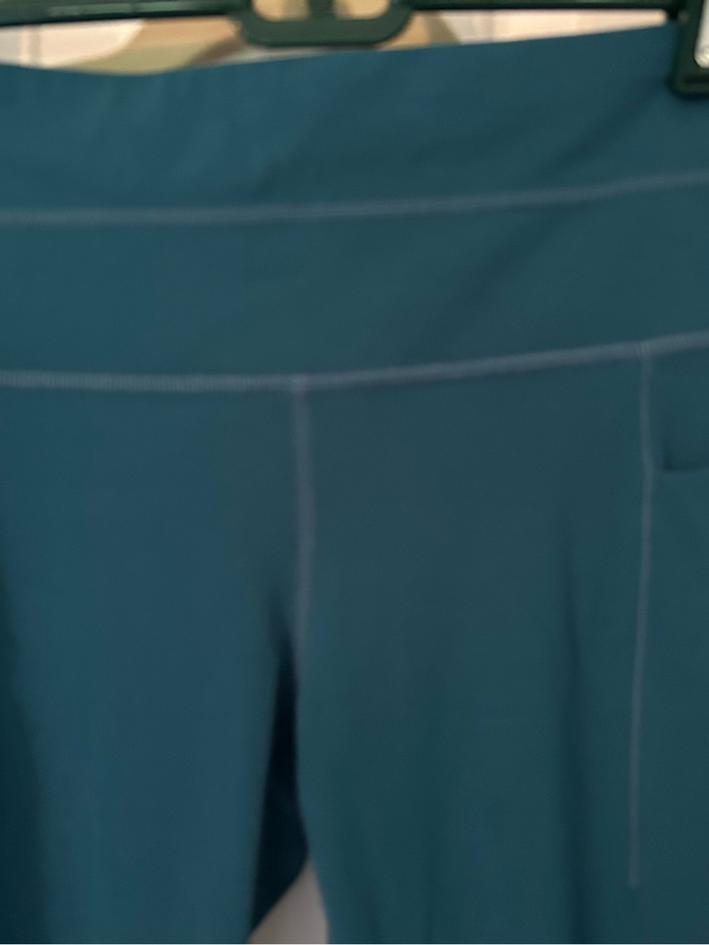Athleta Chakra Teal 7/8 Powervita Tights with Laser Cut Design - Picture 9 of 9